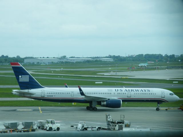 Boeing 757-200 (N206UW) - N206UW B757WL SEEN HERE AT EIDW 21-05-2011 UNDER TOW AFTER PLANE WENT TECH SO NOW BEEN TOWED THIS WAS CHARLOTTE FLIGHT.