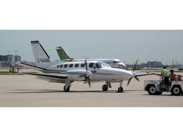 Cessna Conquest 2 (C-GAGE) - A VERY fast aircraft with speeds up tp 320 KTS. Flaps are still extended because the aircraft will be washed.