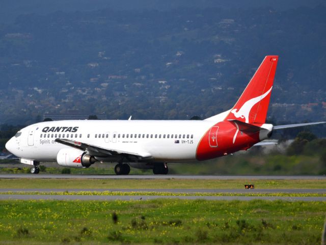BOEING 737-400 (VH-TJS) - Rolling for take off on runway 05. Thursday 12th July 2012.