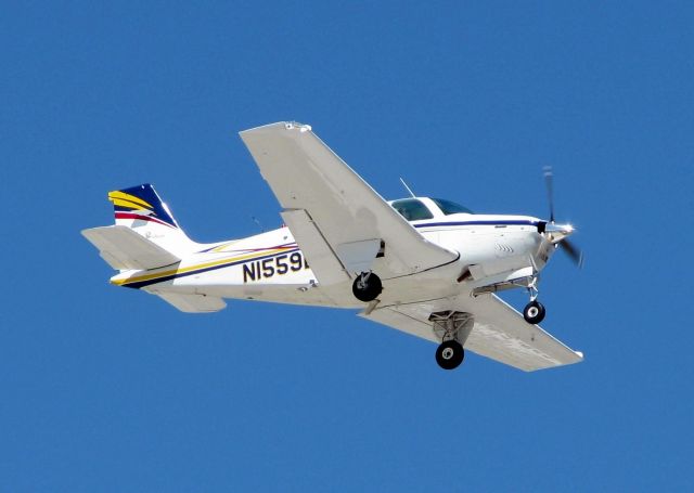 Beechcraft Bonanza (33) (N1559L) - Landing at Shreveports Downtown Airport.