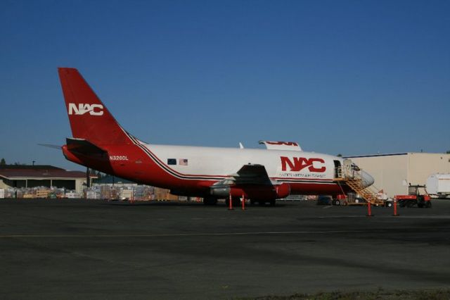 Boeing 737-200 (N320DL) - "Yukon" 737-232F on the ramp at ANC.