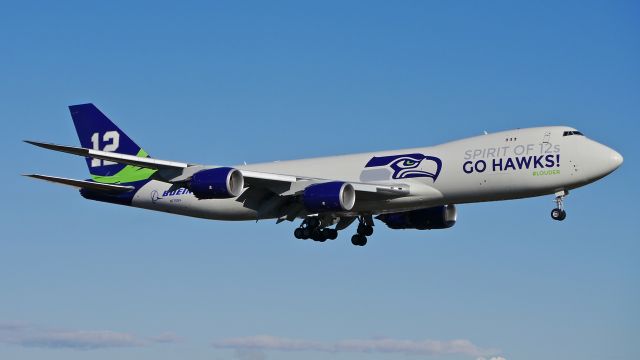 BOEING 747-8 (N770BA) - BOE12 on final to Rwy 16R after a flyover of the Seahawks Victory Celebration on 2/5/14. (LN:1437 cn 37564).