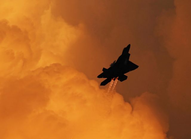 Lockheed F-22 Raptor — - An F-22A in the night airshow at AirVenture 2019 in Oshkosh.