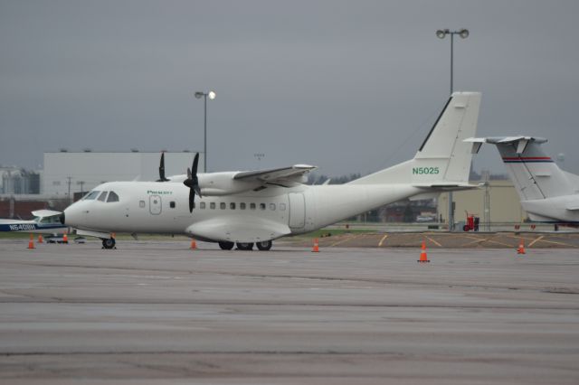 Casa Persuader (CN-235) (N5025) - N5025 sitting on East GA tarmac in KFSD