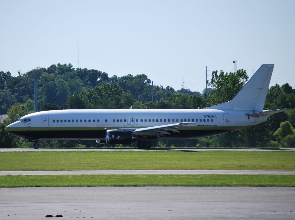 BOEING 737-400 (N753MA) - NASCAR teams departing runway 2 headed for Kentucky at KJQF - 6/27/12