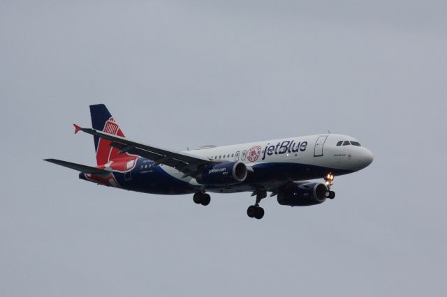 Airbus A320 (N605JB) - Jet Blue A320 arrival to Boston Logan in their revised Boston Red Sox special livery on 4/1/21.