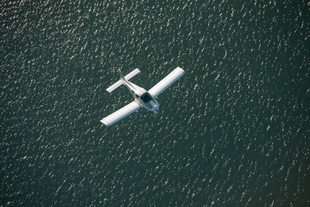 Grumman AA-5 Tiger (N4557V) - Looking down on Folsom Lake, CA.br /©2012 Andy Robinson