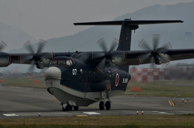 SHINMAYWA US-2 — - Taxing onto Bravo to then hold short for 10 mins. waiting for the L35 (the one I posted) which was doing T & G patterns  .