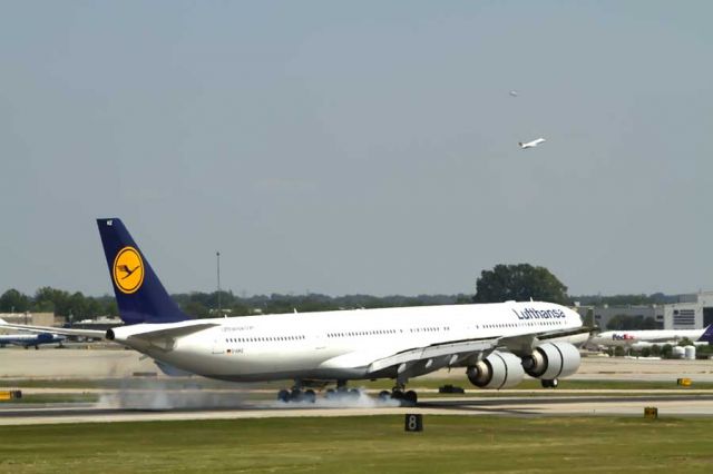 Airbus A340-600 (D-AIHZ) - A little tire smoke after a long flight from Munich. On time, naturally : )