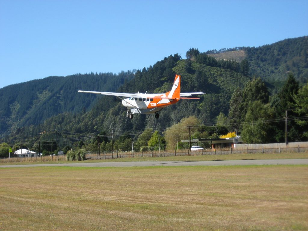 — — - Sounds Air off Picton NZ headed to Wellington