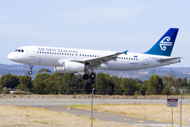 Airbus A320 (ZK-OJK) - About to put down on runway 05, on arrival from Auckland, New Zealand. Friday 19th April 2013.