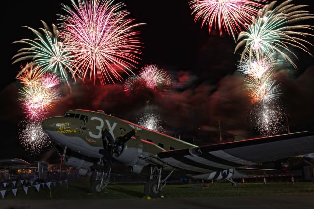 Douglas DC-3 (N47TB) - C-47A/DC-3C "That's All...Brother" with the AirVenture 2019 fireworks.