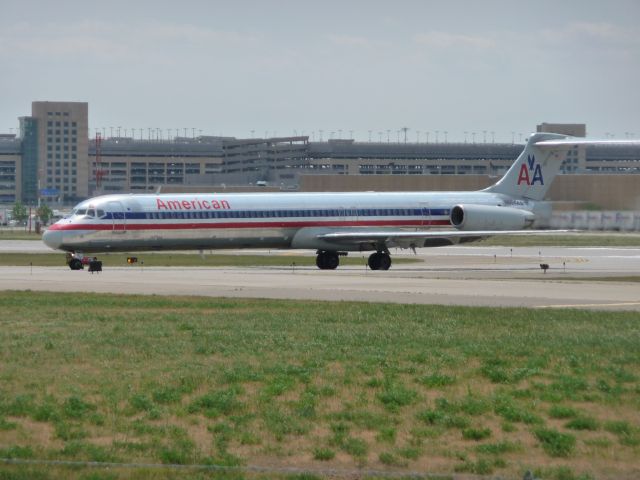 McDonnell Douglas MD-82 (N554AA) - American N554AA taxiing across the end of 12R at KMSP.  June 05, 2009.