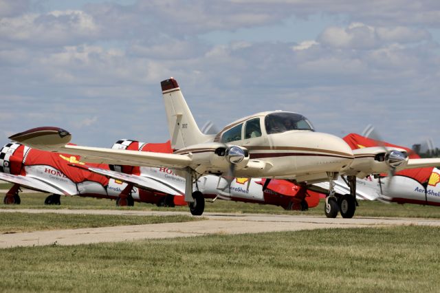 Cessna 310 (N77MJ) - On flightline