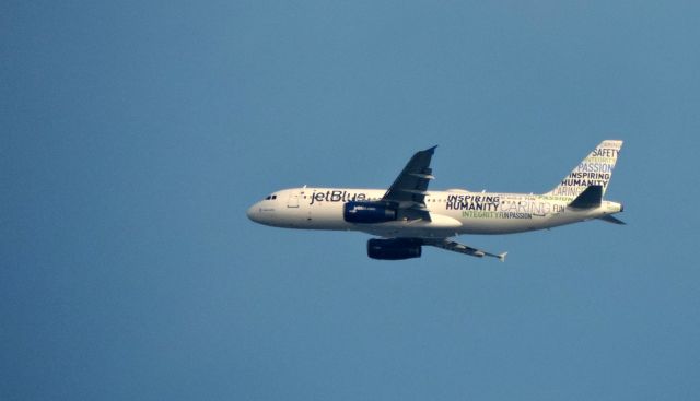 Airbus A320 (N598JB) - Shown here is an Airbus 320 off the coast of Monmouth NJ displaying a livery of what this Airline is all about. 