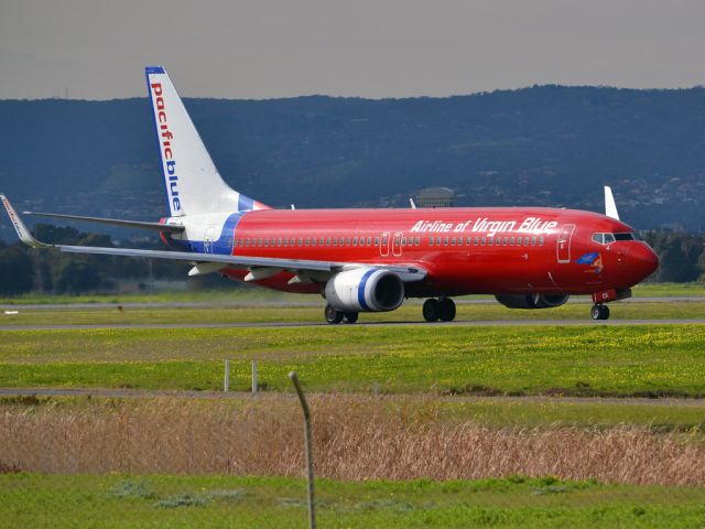 Boeing 737-800 (VH-VOX) - On taxi-way heading for take off on runway 05. Thursday 12th July 2012.