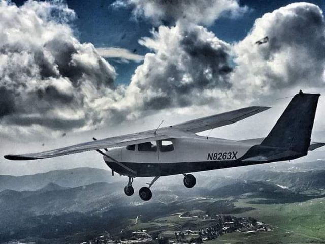 N8263X — - Formation flying with a friend.  His passenger took a photo of me flying my plane. Just south of KREI