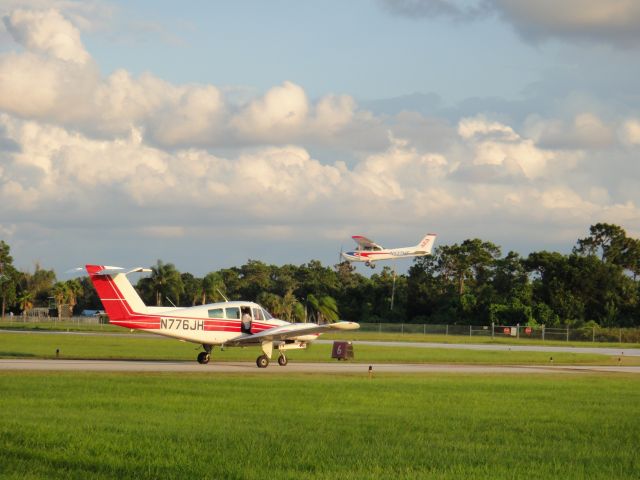 Beechcraft Duchess (N776JH) - holding short rwy 6 at ism while c172 537hf lands