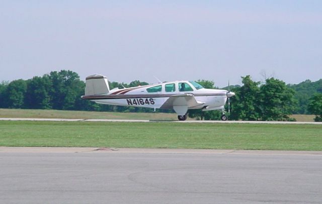 Beechcraft Bonanza (36) (N4164S) - Taxiing to rwy 27 on 6/7/10