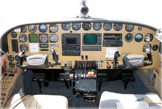 Cessna Chancellor (ZS-LTY) - Complex cockpit of a pressurized piston twin.