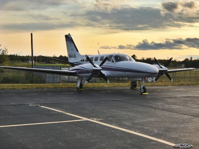 Cessna Conquest 2 (N441JA) - Incoming sunset on the ramp.