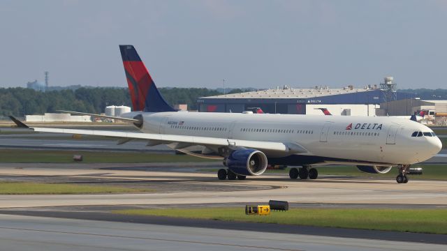 Airbus A330-200 (N803NW) - October 6, 2018 -- Delta 82 taxis out to runway 9L for departure to Paris, France.