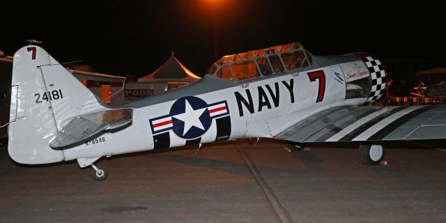 N7054R — - "Sweet Sophia" (N7054R), an AT-6C, piloted in the 2016 National Championship Air Races by Peter Stravrides ((owned by Photocom Aviation), is captured here in the pits at 5:20 AM.  br /* Recommend clicking on FULL to view this photo at best Q. *