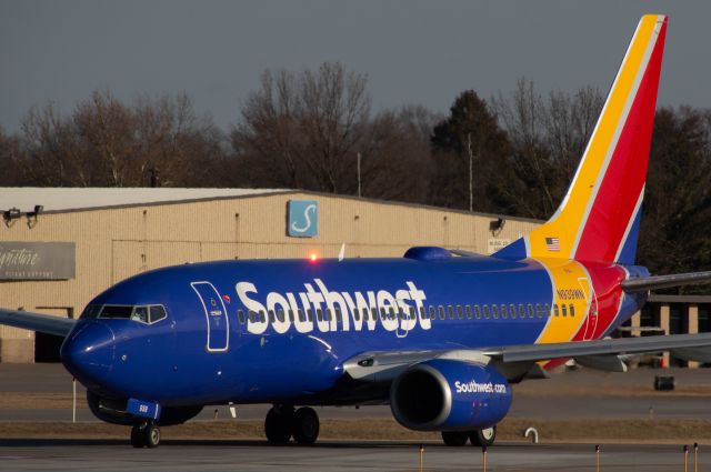 Boeing 737-700 (N939WN) - SWA 546 bound for St. Louis is holding short of Runway 23 waiting on an inbound private jet to land. Photo taken March 4, 2020 at 4:20 PM with Nikon D3200 at 330mm.