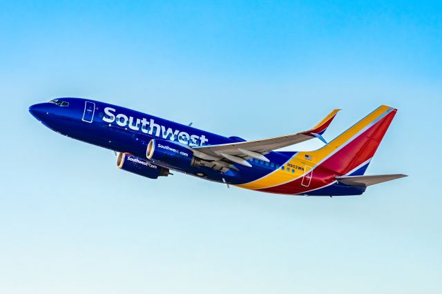 Boeing 737-700 (N902WN) - Southwest Airlines 737-700 taking off at PHX on 12/10/22. Taken with a Canon R7 and Tamron 70-200 G2 lens.