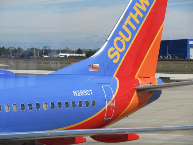 Boeing 737-700 (N289CT) - Sorry I didn't get the special logo on the front. The way the plane was positioned at the gate did not allow me to.