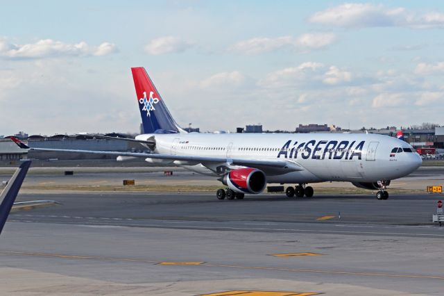 Airbus A330-200 (YU-ARA) - ASL500 passing terminal 5 after landing from BEG.