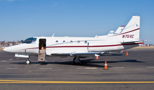 North American Sabreliner (N75VC) - Freshly painted snow white red trimmed Sabreliner 65 @ KBOS Logan. 1st upload in new livery on FlightAware.Com !