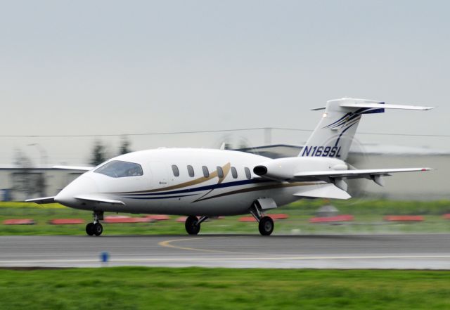 Piaggio P.180 Avanti (N169SL) - 2007 PIAGGIO P180 departing runway one-two, Merced Regional Airport. (KMCE)