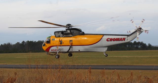 Sikorsky Sea King (N1048Y) - A Croman Corporation Sikorsky S-61A Sea King departing Northeast Alabama Regional Airport, Gadsden, AL, from the taxiway as the sun finally breaks through - December 9, 2019. 