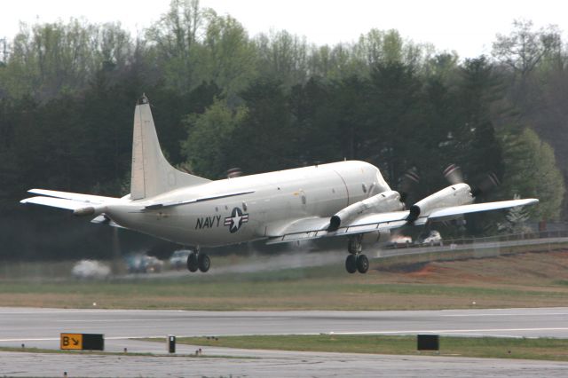 — — - P-3C Orion doing touch and gos at the Hickory Airport on 3-28-2008 at 18:19