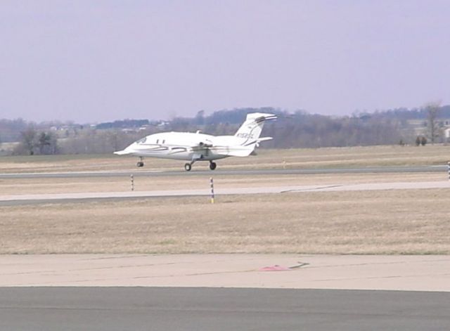 Piaggio P.180 Avanti (N158SL) - Departing runway 27; 3/5/09...