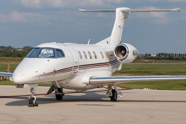 Embraer Phenom 300 (N419QS) - NetJets 419 sits on the ramp after a flight from Lewisburg, West Virginia.