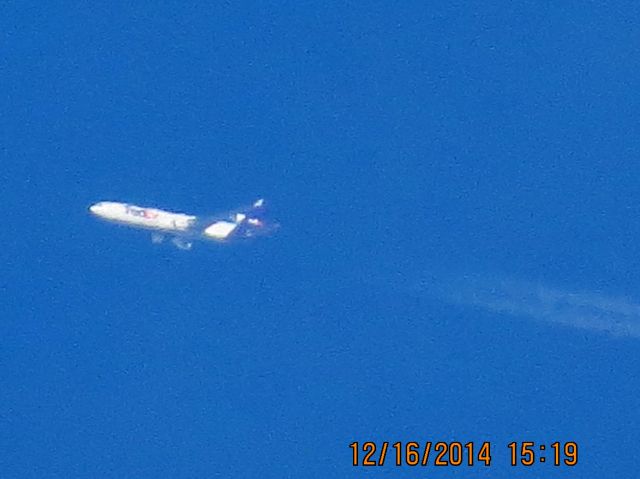 Boeing MD-11 (N608FE) - FedEx flight 900 from MEM to SEA over Southeastern Kansas at 36,000 feet.