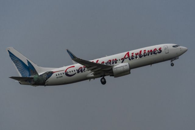 Boeing 737-800 (9Y-KIN) - Caribbean departing KMCO under light precipitation and a lowering ceiling during a nasty central Florida storm. 