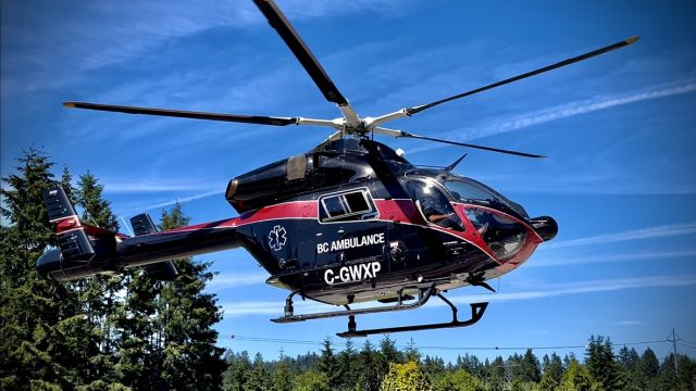 McDonnell Douglas MD-90 (C-GWXP) - This side of the helicopter rotor wash zone and it was strong... Difficult to keep the camera steady. This photo was a screen capture from a 4K video taken which I posted on my YouTube channel: https://youtu.be/pgMiSuZHVaE