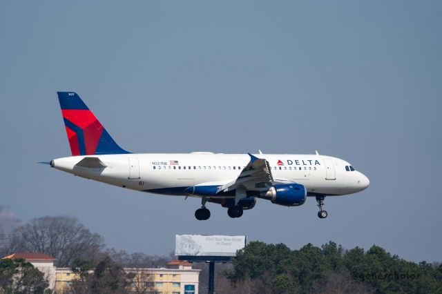 Airbus A319 (N327NB) - I was standing on the top of the 'north' garage, when this aircraft came in for a landing on Runway 8. 