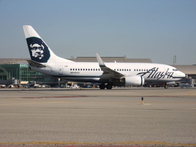 Boeing 737-700 (N649AS) - Holding on RWY 19R
