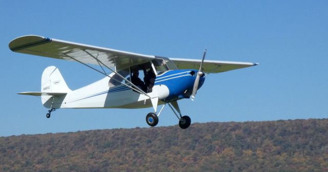 CHAMPION Tri-Traveler (N1885E) - On short final with the Kittatinny Ridge of the Appalchian Mountains nearby is this 1946 Aeronca 7AC Champion Tri-Traveler in the Autumn of 2022.