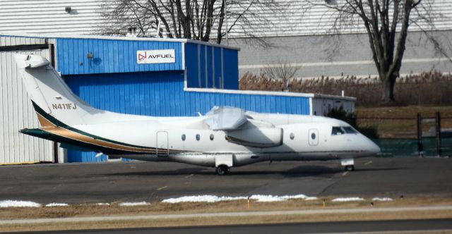 Fairchild Dornier 328JET (N411FJ) - Catching some tarmac time is this 2000 Fairchild Dornier 328-300 in the Winter of 2022.