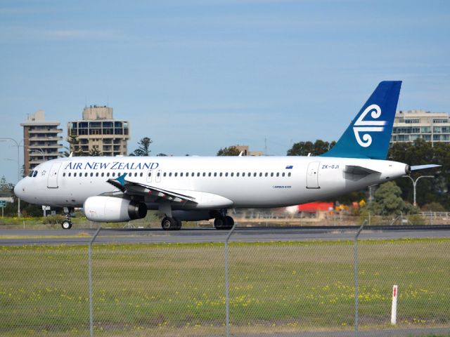 Airbus A320 (ZK-OJI) - On taxi-way heading for take off on runway 05, for flight home to Auckland, New Zealand. Thursday 12th July 2012.