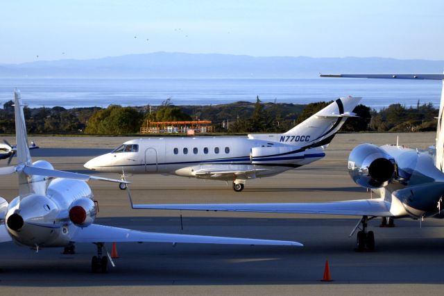 Hawker 800 (N770CC) - KMRY - Charlie Charlie rolling to the crowded Monterey Jet center after landing Runway 28 at Monterey,CA during the 2015 AT&amp;T Pro Am.