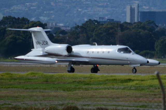 Learjet 35 (VH-JCR) - On taxiway heading for take-off on runway 05. Thursday, 8th May 2014.