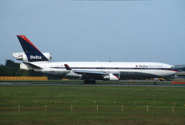 Boeing MD-11 (N804DE) - Departure at Narita Intl Airport Rwy16R on 2002/05/03