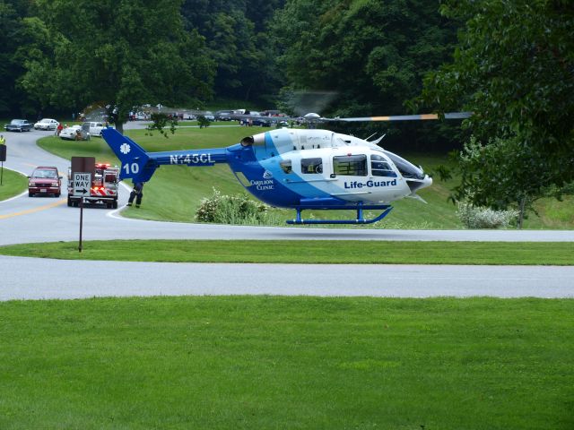 KAWASAKI EC-145 (N145CL) - Accident took place on the Blueridge Parkway in Virginia . They had to fly in two Life Guard helos to move the injured folks