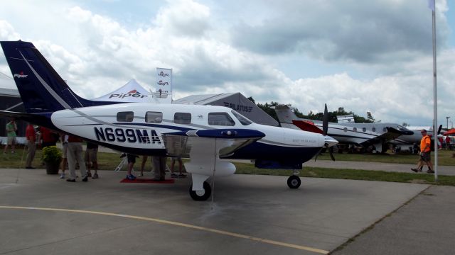 Piper Malibu Mirage (N699MA) - First Time at Oshkosh.